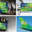 Four mockups of green DuoLingo advertising on airport signage