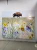 Buffalo standing in a field of native wildflowers. Done in oil paints.