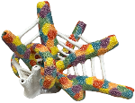 A ceramic piece of coral covered in glossy splotches of various colors aside from matte white sections, including webbing between tubes of coral.