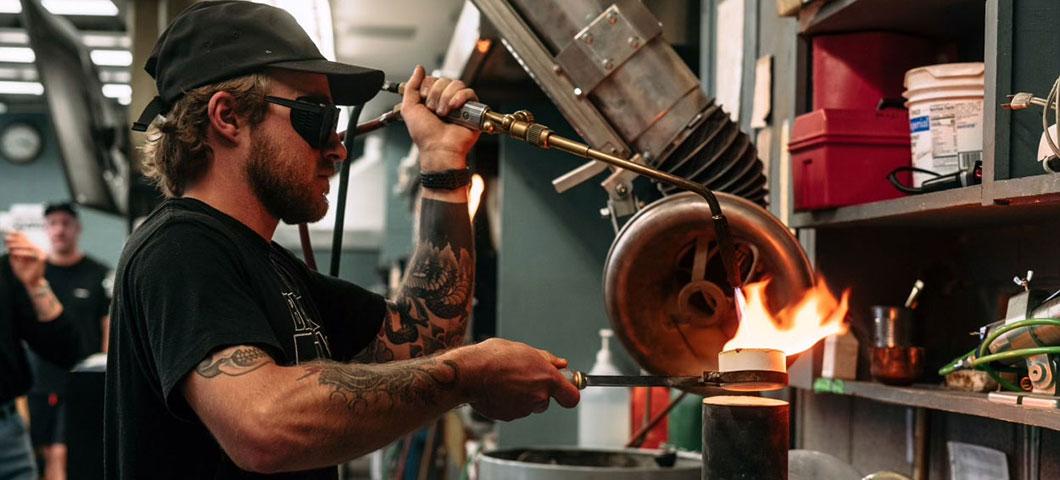 A student uses the studio to melt down metal. 