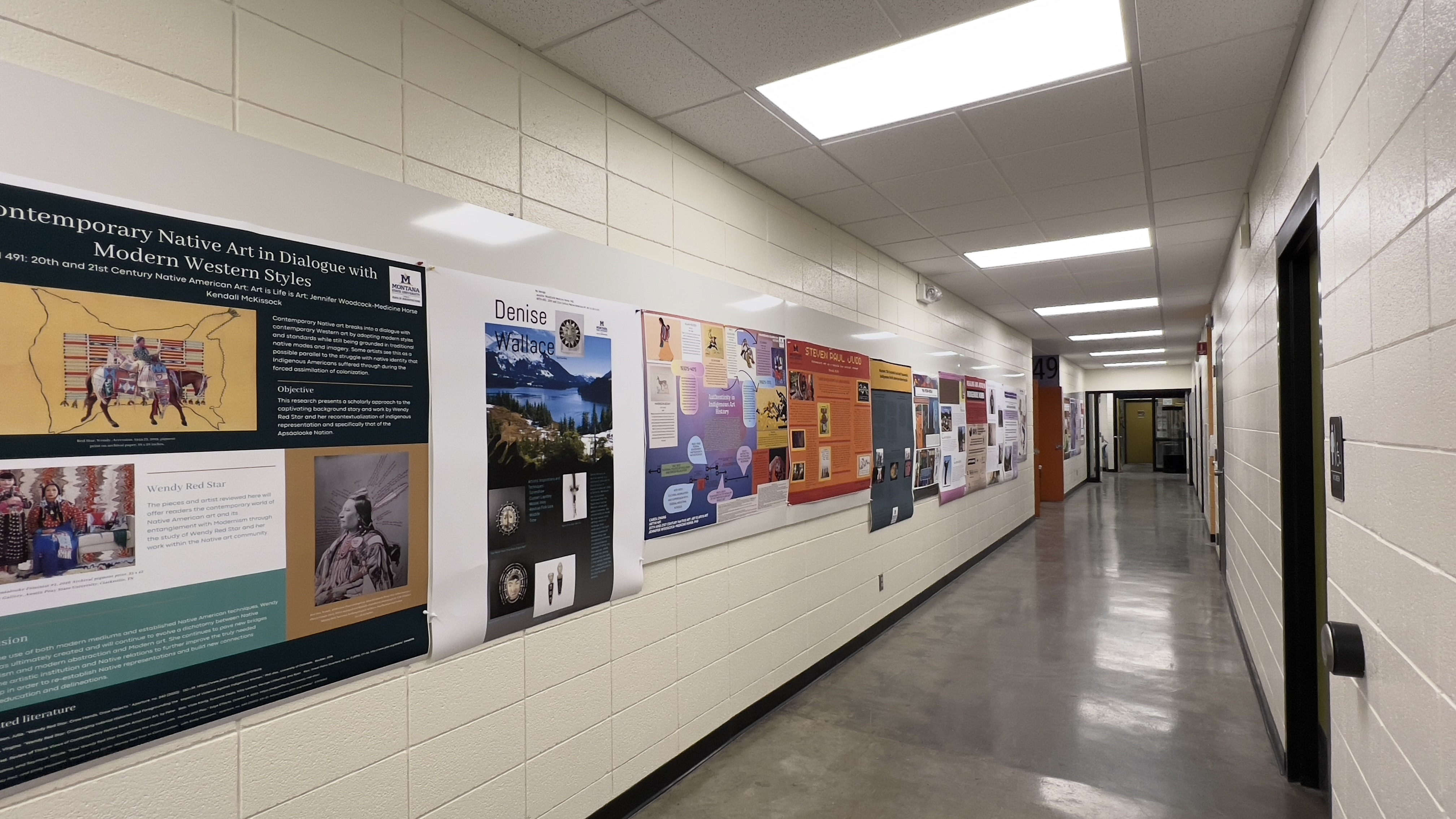Hallway with ARTH 491 research posters on the walls 